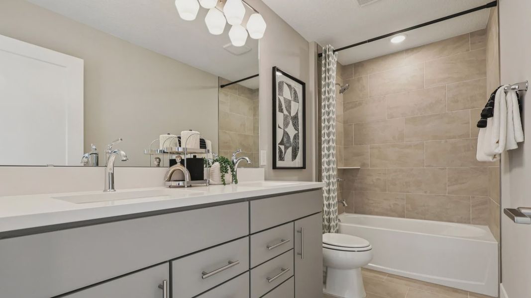 The Mangrove Upstairs Bathroom at Lakeside at Satilla by DRB Homes in Saint Cloud, FL The Mangrove Upstairs Bathroom at Lakeside at Satilla by DRB Homes in Saint Cloud, FL