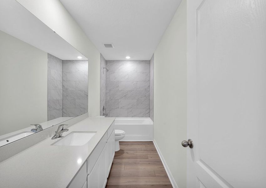 Representative furnished interior of a home built from the Caprice by LGI Homes in Westport Landing, Jacksonville (Image 5).