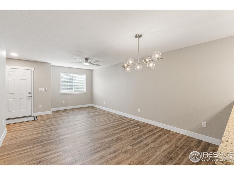Open Floor Plan with Lots of Light, and Luxury Vinyl Flooring throughout Main Floor