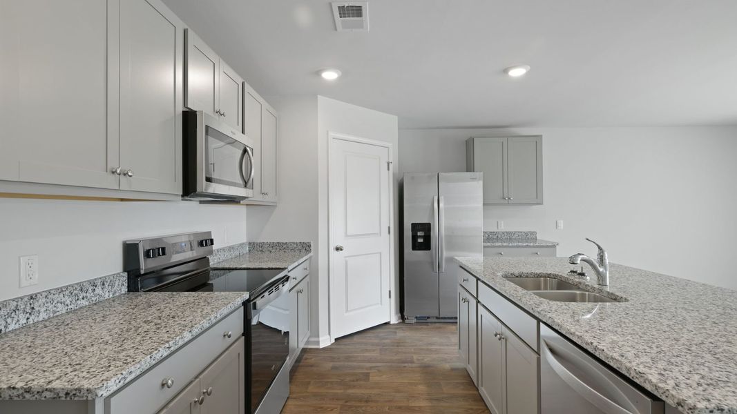 Representative furnished interior of a home built from the CALI by D.R. Horton in Evergreen, Holly Hill (Image 5). Representative furnished interior of a home built from the CALI by D.R. Horton in Evergreen, Holly Hill (Image 5).