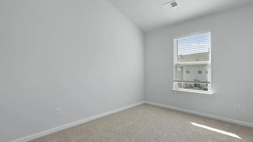Spacious, unfurnished interior of a new home in Pine Hills Townhomes at Cane Bay, Summerville (Image 18). Spacious, unfurnished interior of a new home in Pine Hills Townhomes at Cane Bay, Summerville (Image 18).