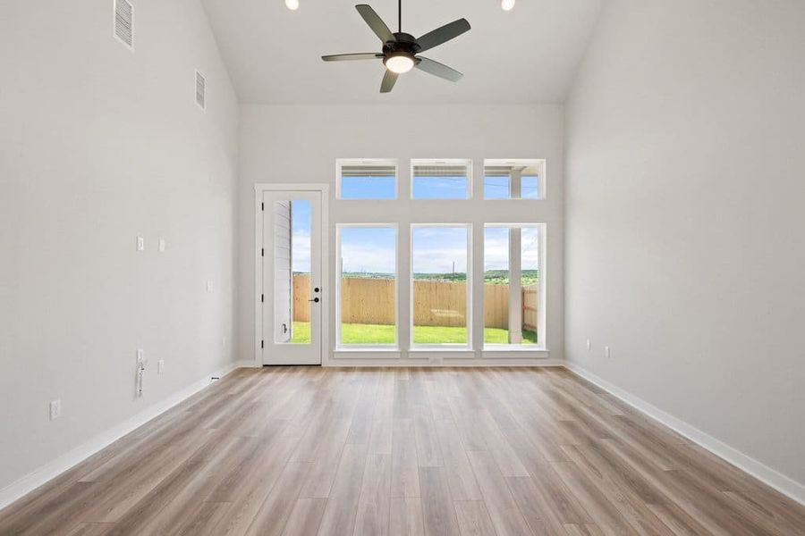 Spacious, unfurnished interior of a new home in Terrace Collection At Turner's Crossing, Buda (Image 35).