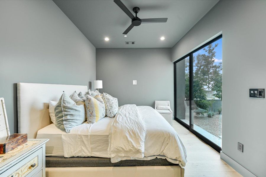 Bedroom featuring access to exterior, a ceiling fan, recessed lighting, and wood finished floors