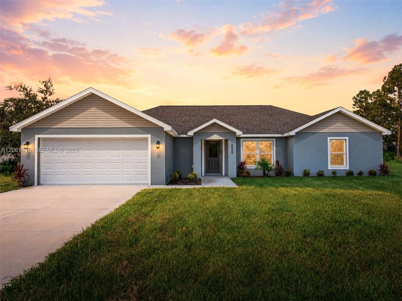 Front exterior of a new home in , Sebring, FL, highlighting curb appeal (Image 2). Front exterior of a new home in , Sebring, FL, highlighting curb appeal (Image 2).