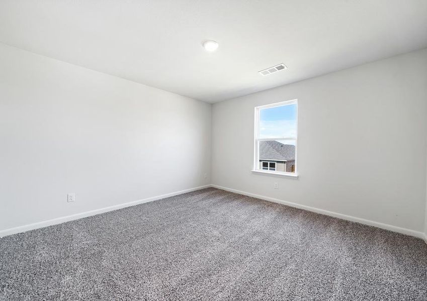 The secondary bedroom in the Cypress is a great space for a child's bedroom.