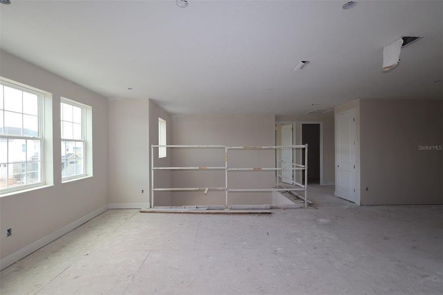 In-progress construction of a new home in Center Lake on the Park, St. Cloud, FL (Image 7).