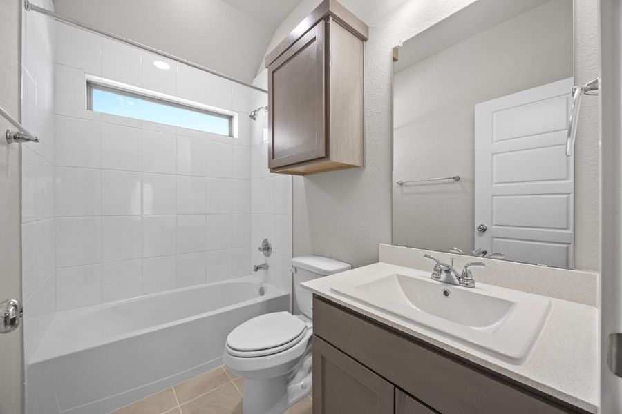 Bathroom in the Cypress home plan by Trophy Signature Homes - REPRESENTATIVE PHOTO Bathroom in the Cypress home plan by Trophy Signature Homes - REPRESENTATIVE PHOTO