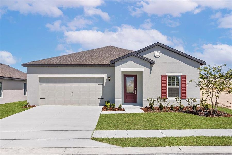 Front exterior of a new home in Peach Crossings, Winter Haven, FL, highlighting curb appeal (Image 2). Front exterior of a new home in Peach Crossings, Winter Haven, FL, highlighting curb appeal (Image 2).