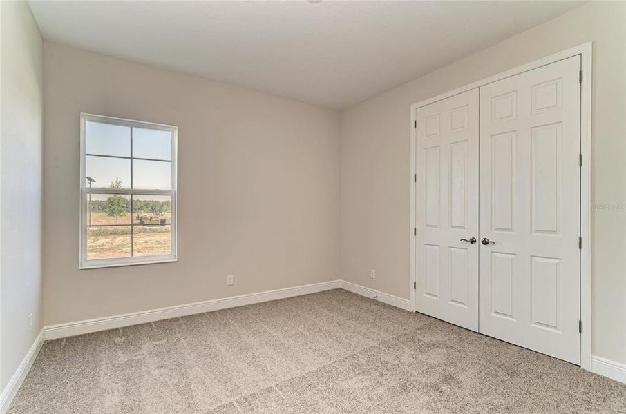 Spacious, unfurnished interior of a new home in Pasadena Woods, Wesley Chapel (Image 23).