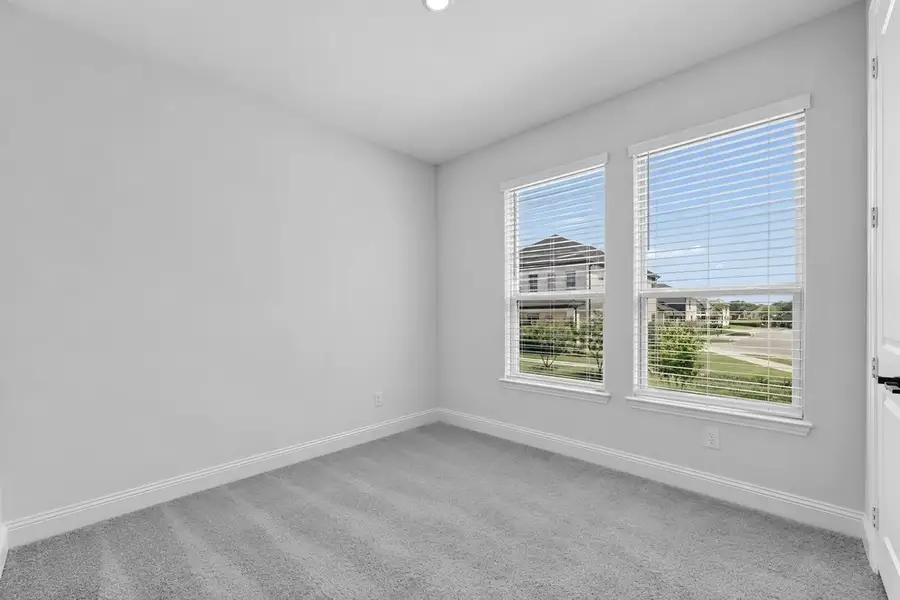 Spacious, unfurnished interior of a new home in Cross Creek Meadows, Celina (Image 27).