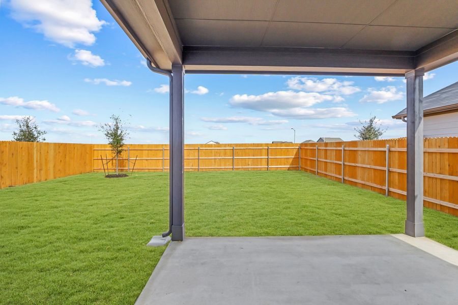 Exterior details and patio area of a home in Prairie Winds, Hutto (Image 4).