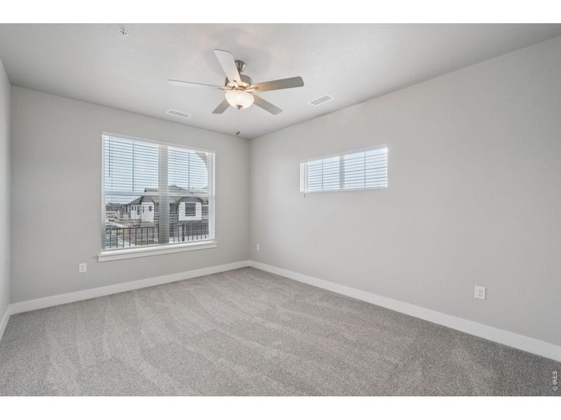 Spacious, unfurnished interior of a new home in Highlands at Fox Hill - The Flats, Longmont (Image 18).