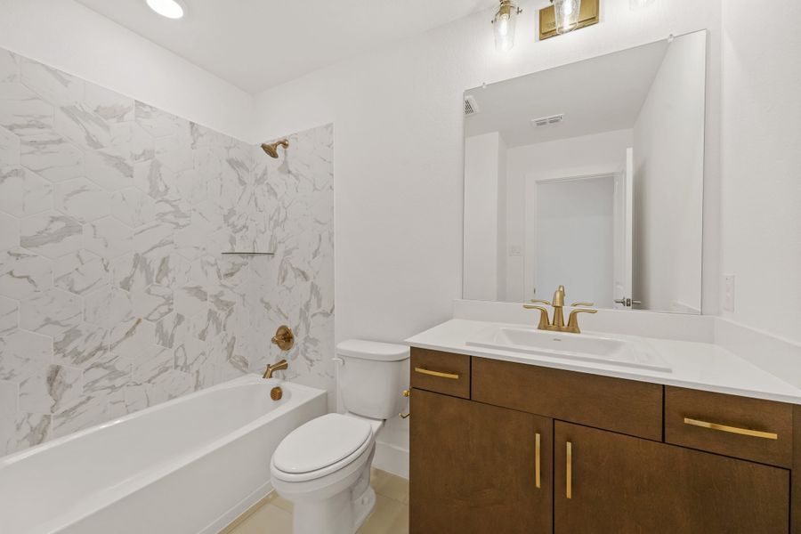 Furnished interior view inside a new home in Union Park, Little Elm (Image 7).