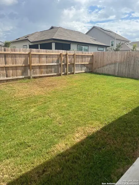 Front exterior of a new home in Highland Ridge, New Braunfels, TX, highlighting curb appeal (Image 10).