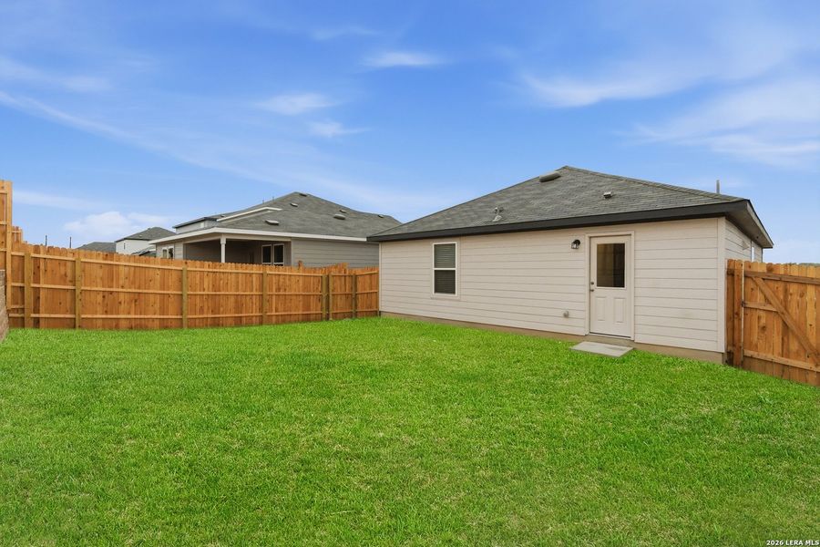 Exterior details and patio area of a home in Vista Real, Converse (Image 19).