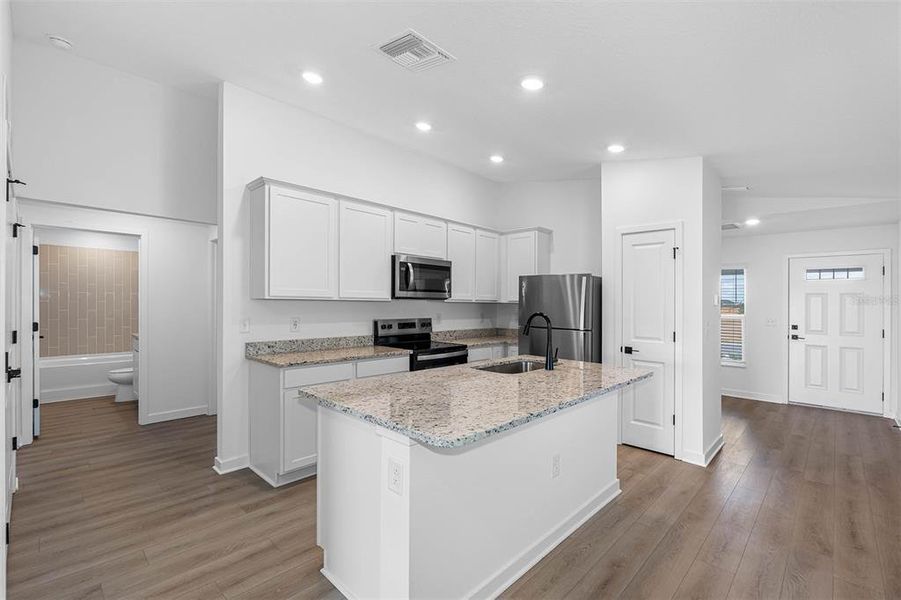 Furnished interior view inside a new home in Trilby Crossing, Brooksville (Image 4).