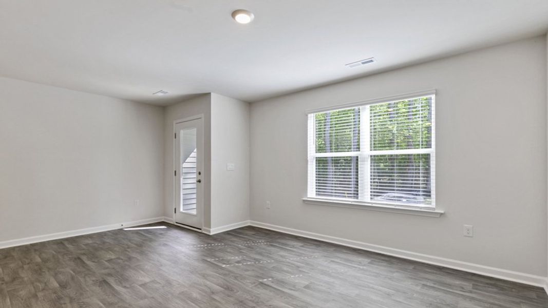 Spacious, unfurnished interior of a new home in Edinborough Townes, Gibsonville (Image 9).