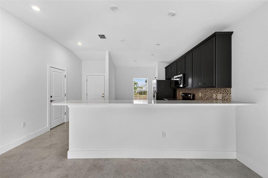 Furnished interior view inside a new home in , Port Charlotte (Image 10).