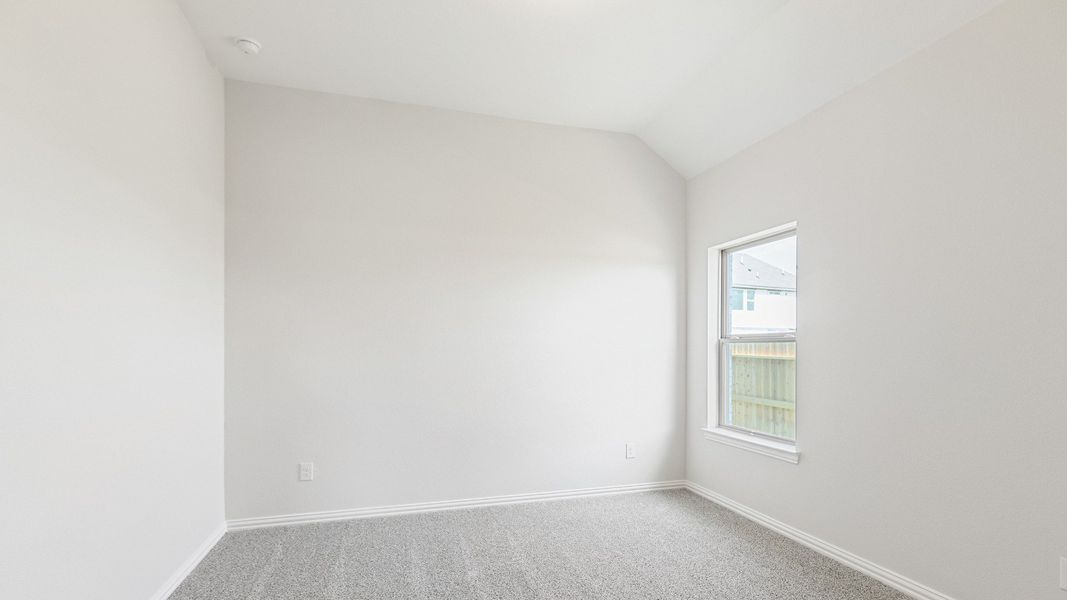 Furnished interior view inside a new home in Sunterra, Katy (Image 12).
