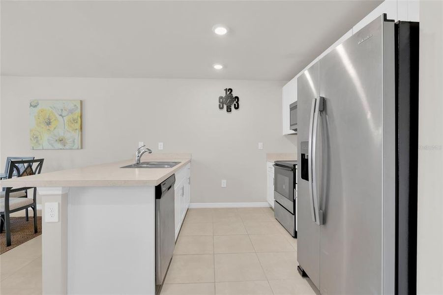 Furnished interior view inside a new home in , Port Charlotte (Image 16). Furnished interior view inside a new home in , Port Charlotte (Image 16).