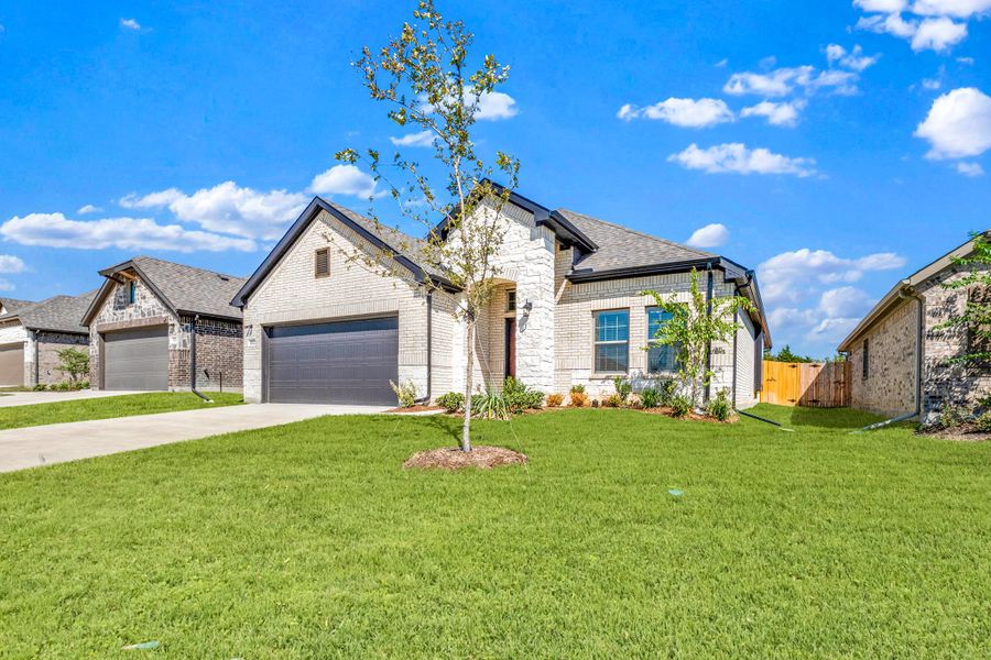 Front exterior of a new home in Summerwood, Red Oak, TX, highlighting curb appeal (Image 22).