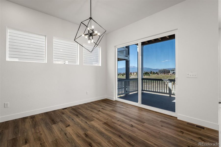 Spacious, unfurnished interior of a new home in Revel Crossing at Wolf Ranch - The Panorama Collection, Colorado Springs (Image 36).