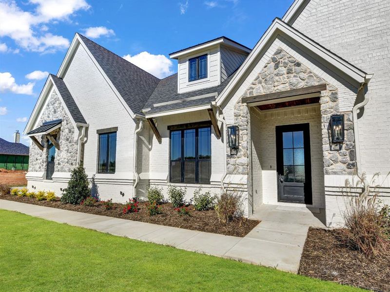 View of front of home with a front yard