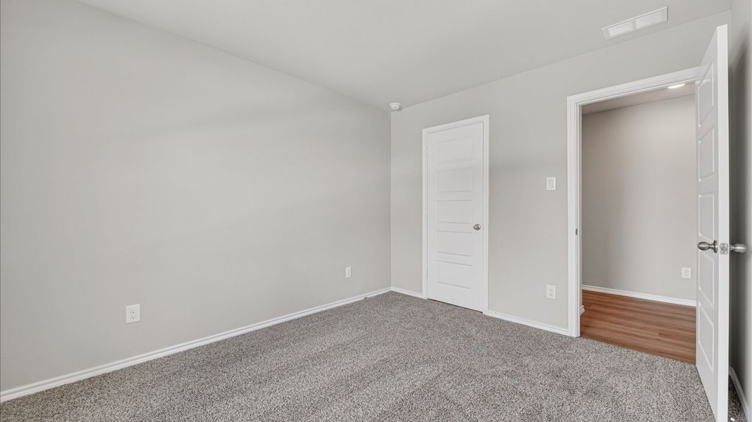 Representative unfurnished interior of a home built from the Bailey by D.R. Horton in Sunnycreek, Crowley (Image 39).
