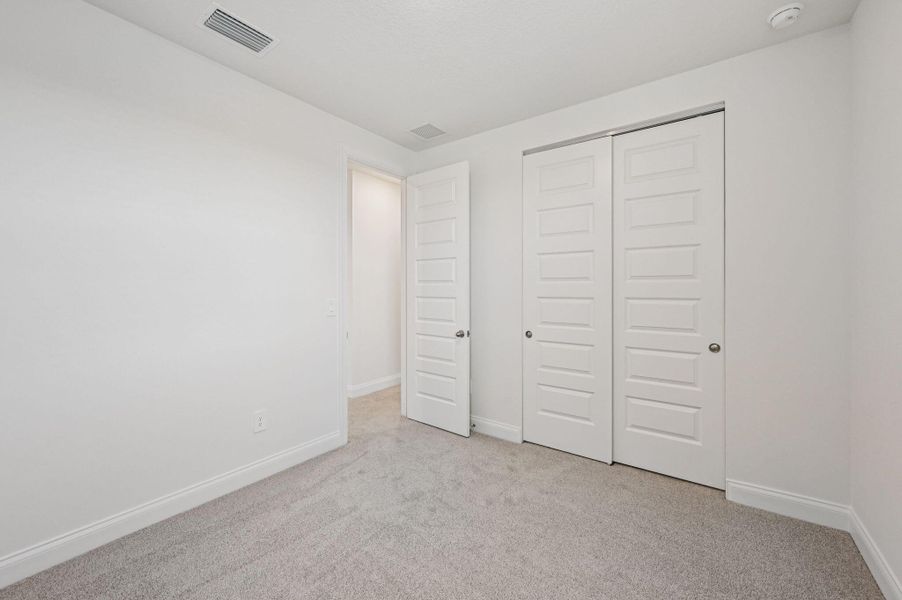 Spacious, unfurnished interior of a new home in Brystol at Wylder - Reserve Series, Port St. Lucie (Image 38).