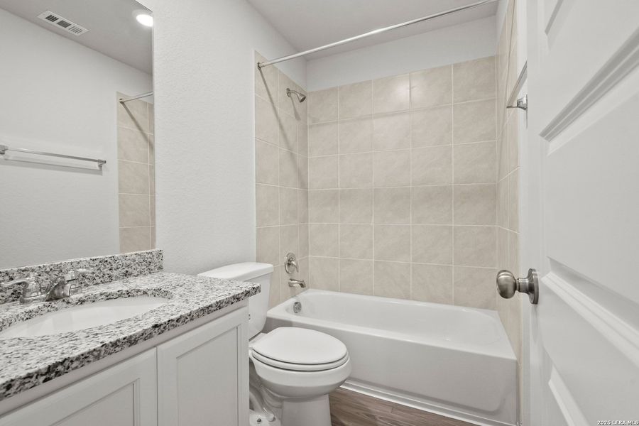 Furnished interior view inside a new home in Hunters Ranch, San Antonio (Image 7).