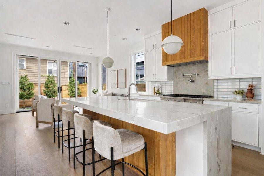 Custom cabinetry and gorgeous stone countertops.