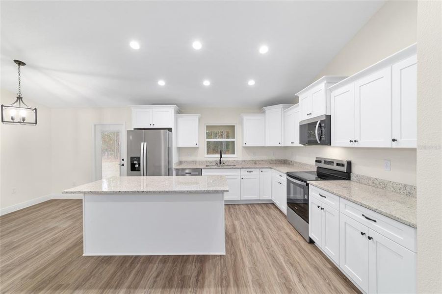 Furnished interior view inside a new home in , Dunnellon (Image 8).