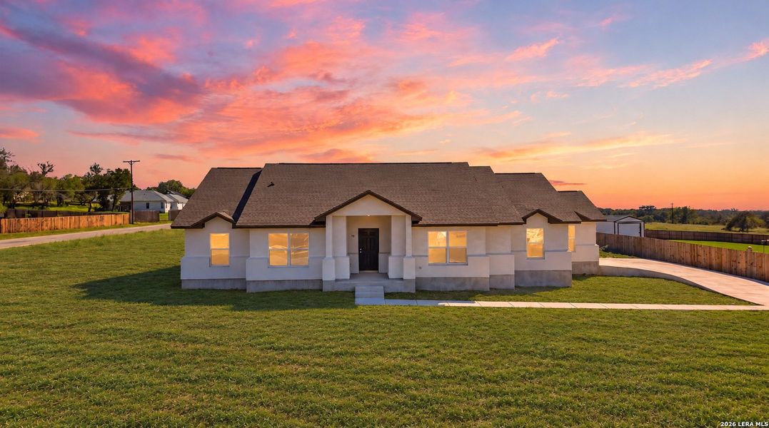 Front exterior of a new home in , Poteet, TX, highlighting curb appeal (Image 25).