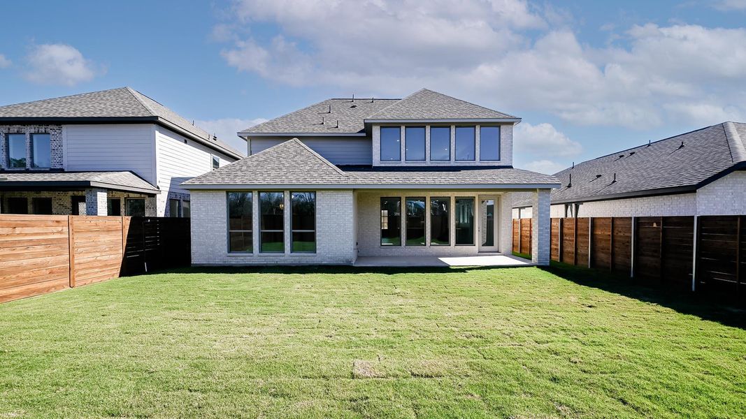 Exterior details and patio area of a home in Juniper Springs, Lockhart (Image 3).