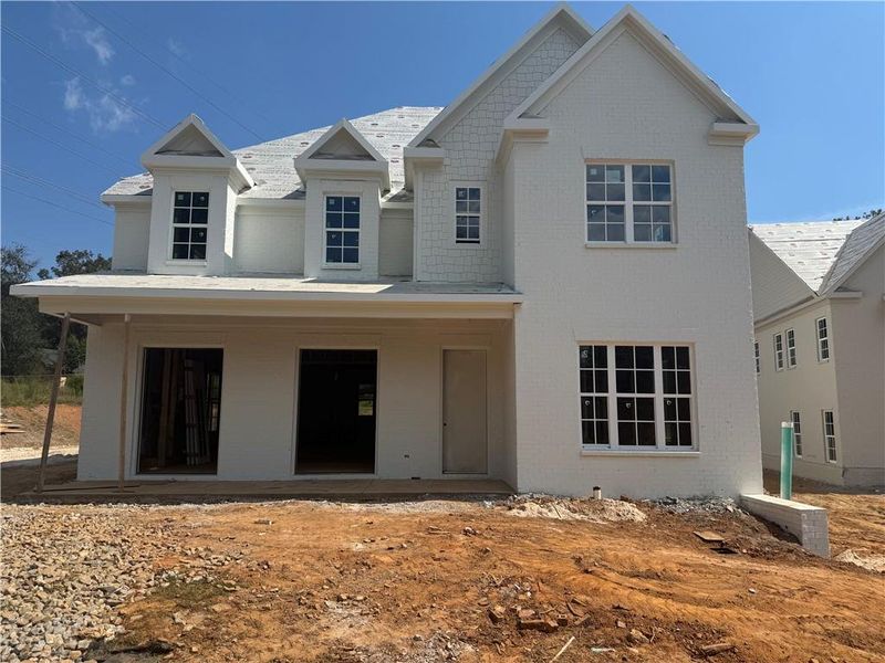 Front exterior of a new home in , Suwanee, GA, highlighting curb appeal (Image 14). Front exterior of a new home in , Suwanee, GA, highlighting curb appeal (Image 14).