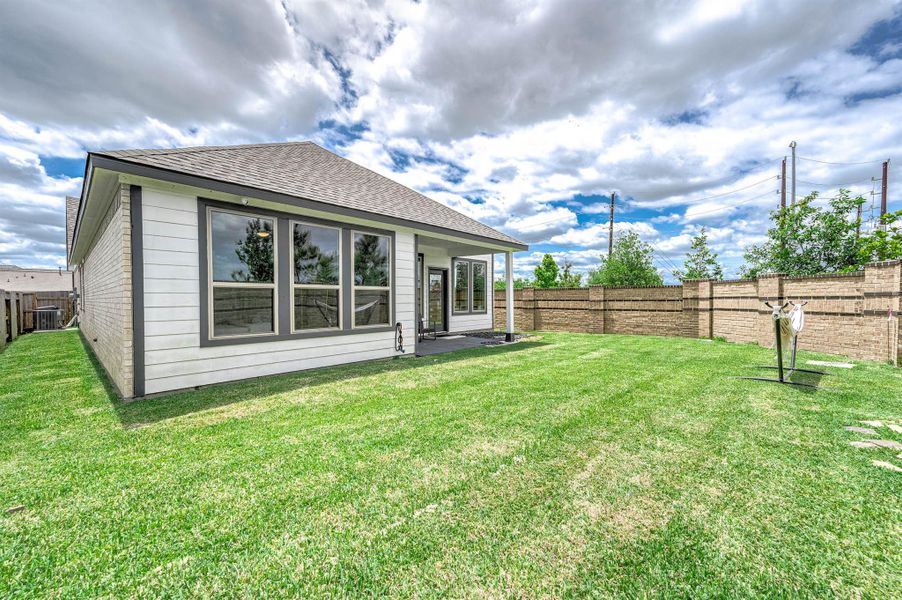 Exterior details and patio area of a home in , Beasley (Image 24).