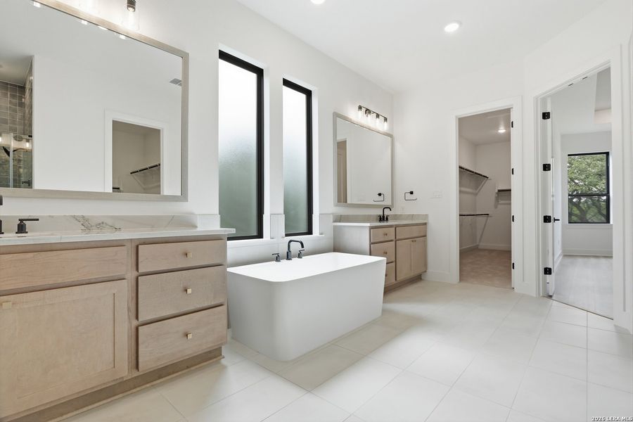 Furnished interior view inside a new home in Enchanted Bluff, San Antonio (Image 11).
