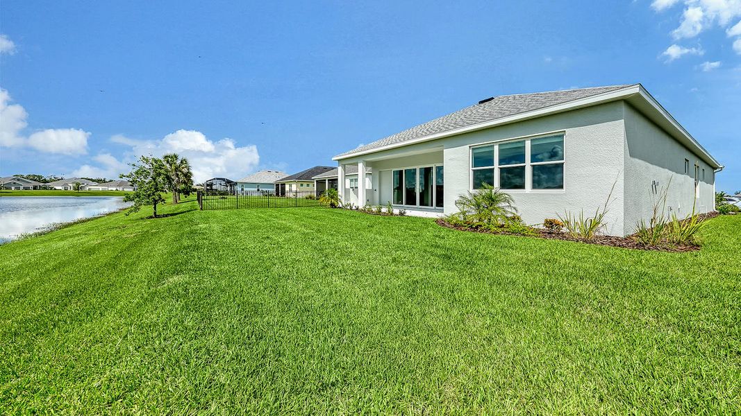 Exterior details and patio area of a home in Canoe Creek Real Estate and Homes for Sale in Parrish, FL - Neal Communities, Parrish (Image 21). Exterior details and patio area of a home in Canoe Creek Real Estate and Homes for Sale in Parrish, FL - Neal Communities, Parrish (Image 21).