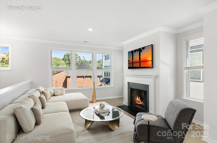 Main level great room (virtually staged) Main level great room (virtually staged)