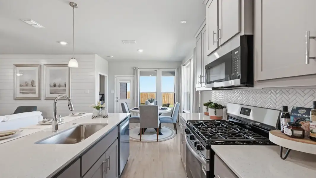 Furnished interior view inside a new home in Bluestem, Rhome (Image 11).