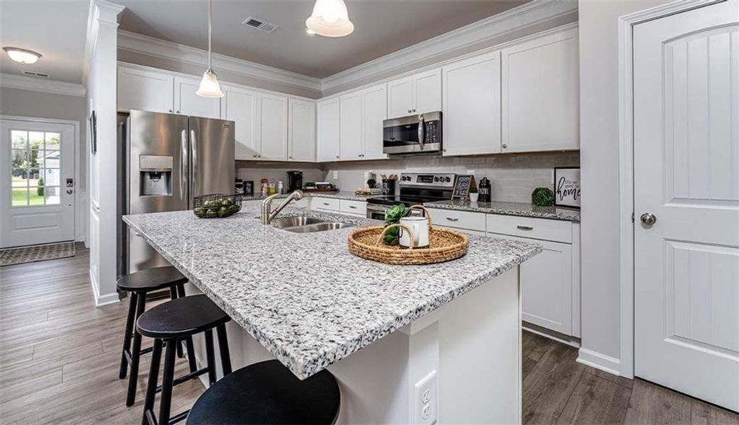 Furnished interior view inside a new home in Summerfield Place, Carrollton (Image 6). Furnished interior view inside a new home in Summerfield Place, Carrollton (Image 6).