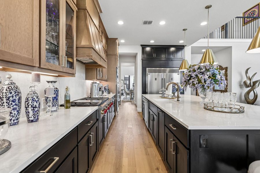 Furnished interior view inside a new home in Sienna, Missouri City (Image 9).