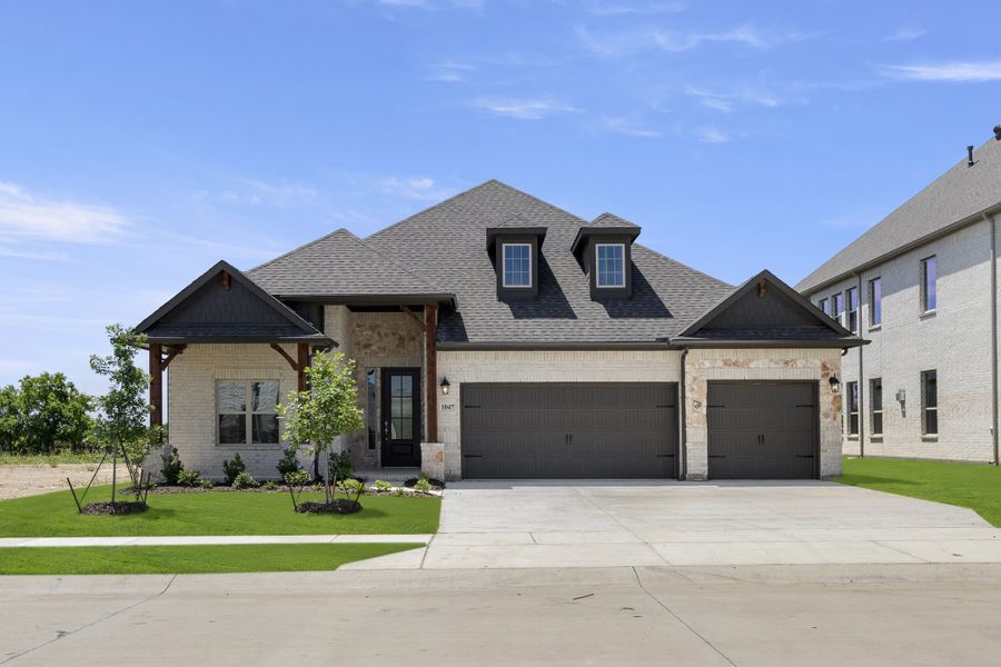 Representative exterior photo of a completed home built from the Cedarwood II by Sandlin Homes in Lakesong, Midlothian, TX (Image 21).