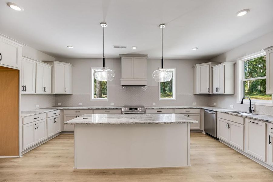 Furnished interior view inside a new home in LOVVORN ESTATES, Carrollton (Image 5).