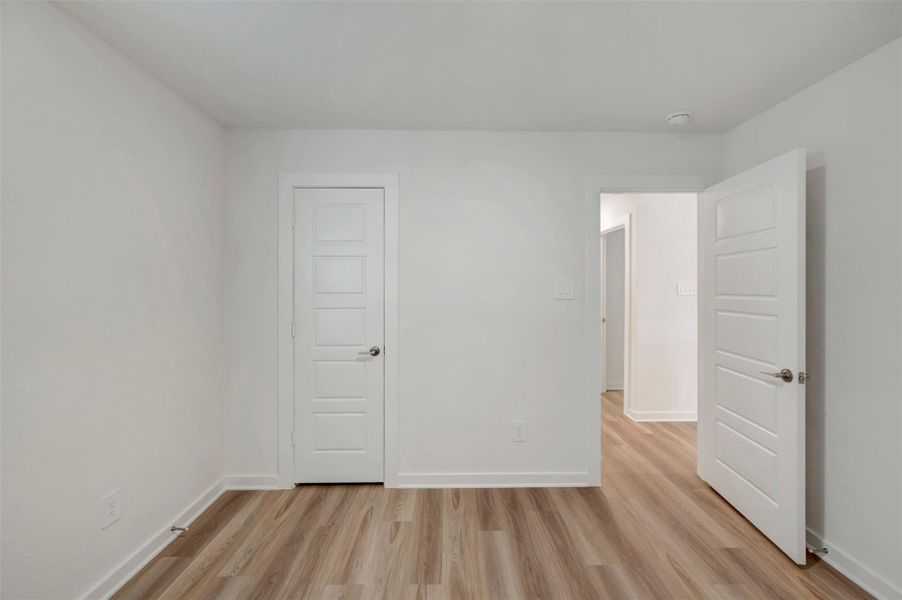 Spacious, unfurnished interior of a new home in Pinewood at Grand Texas, New Caney (Image 15). Spacious, unfurnished interior of a new home in Pinewood at Grand Texas, New Caney (Image 15).