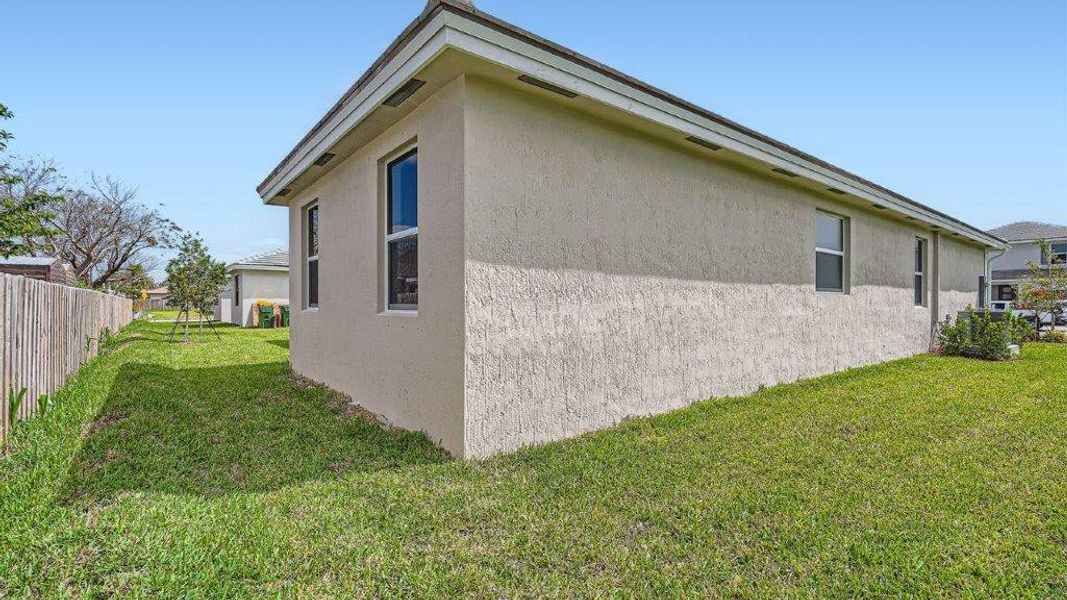 Representative exterior photo of a completed home built from the Davenport by D.R. Horton in Messina Place, Homestead, FL (Image 50). Representative exterior photo of a completed home built from the Davenport by D.R. Horton in Messina Place, Homestead, FL (Image 50).