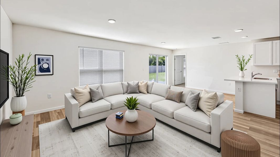 Representative furnished interior of a home built from the DAKOTA by D.R. Horton in Marion County Spot Lots, Ocala (Image 4).