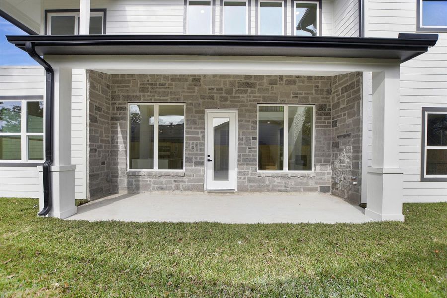 Exterior details and patio area of a home in , Houston (Image 3). Exterior details and patio area of a home in , Houston (Image 3).