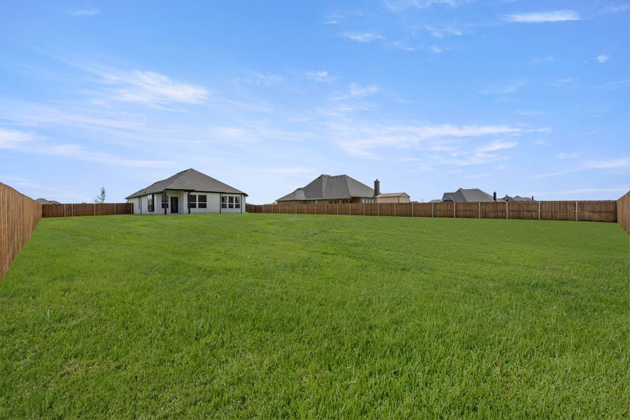 Exterior details and patio area of a home in Coyote Crossing, Godley (Image 20). Exterior details and patio area of a home in Coyote Crossing, Godley (Image 20).