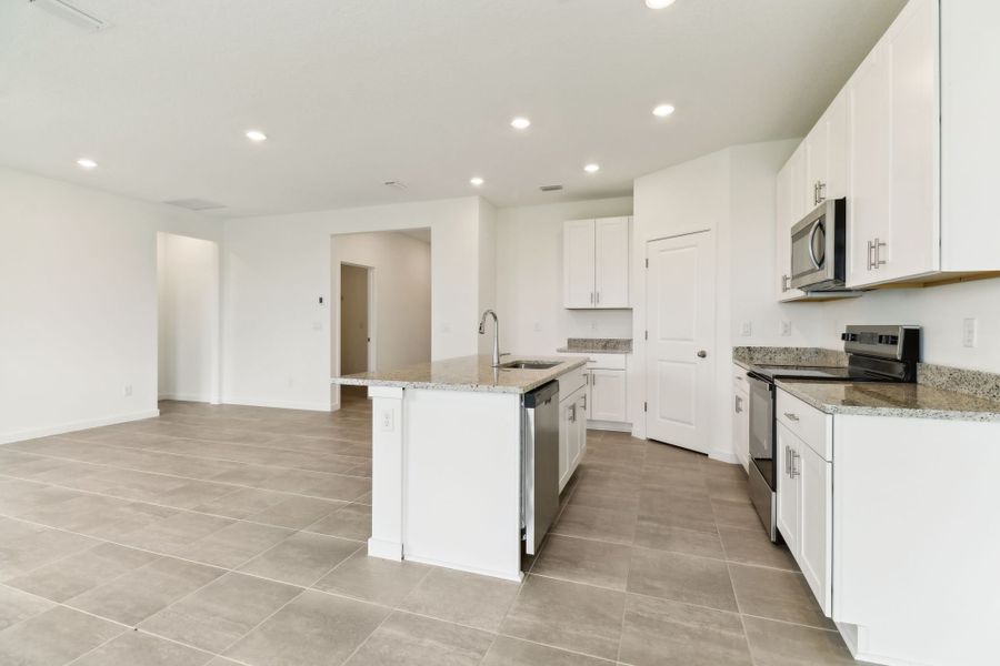 Kitchen of the Bluebell plan in Lakes at Bella Lago.